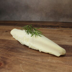 Photo d'une bouyguette, fromage de chèvre frais en forme de fuseau.